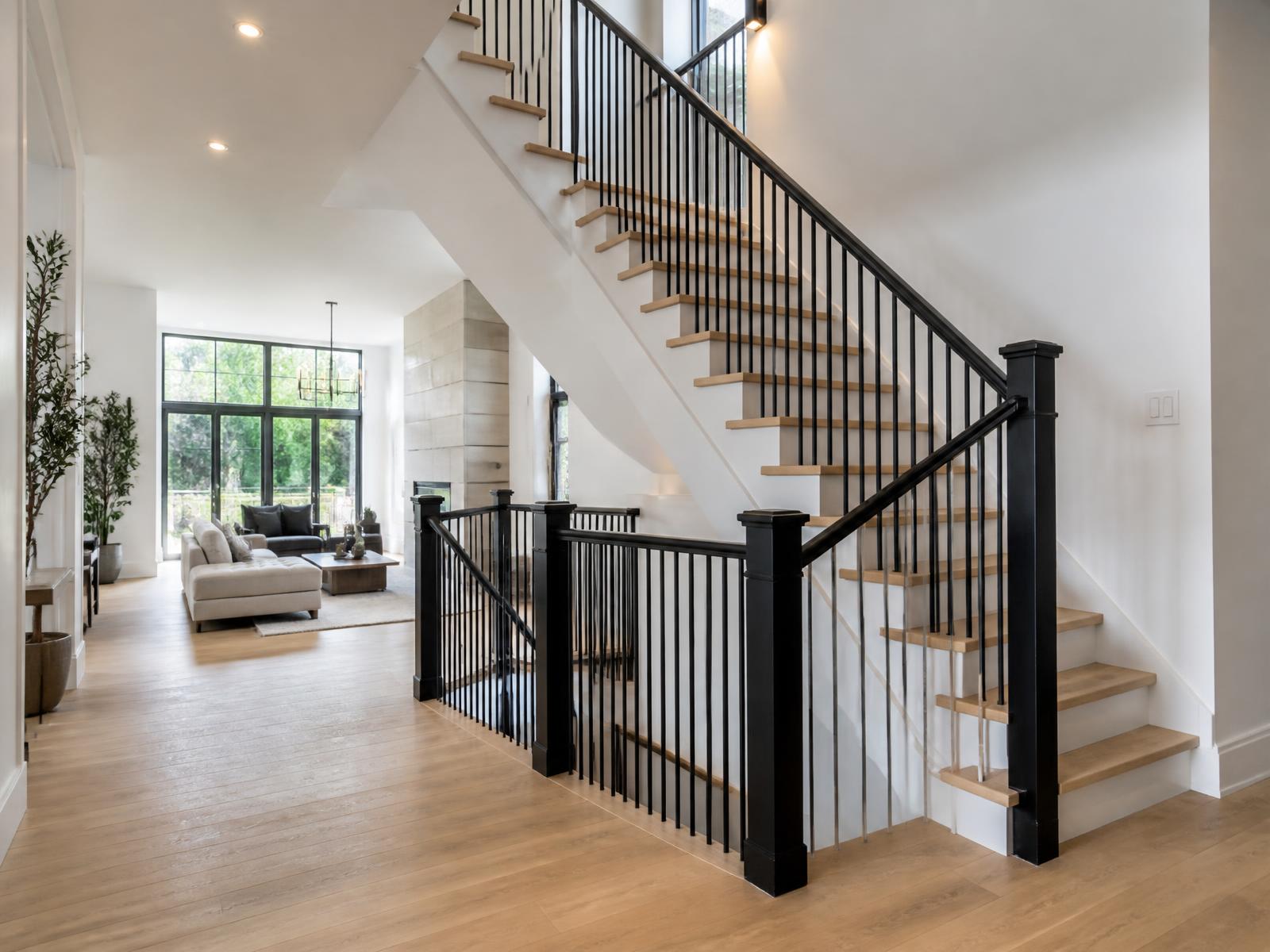 Open-concept staircase in statement black